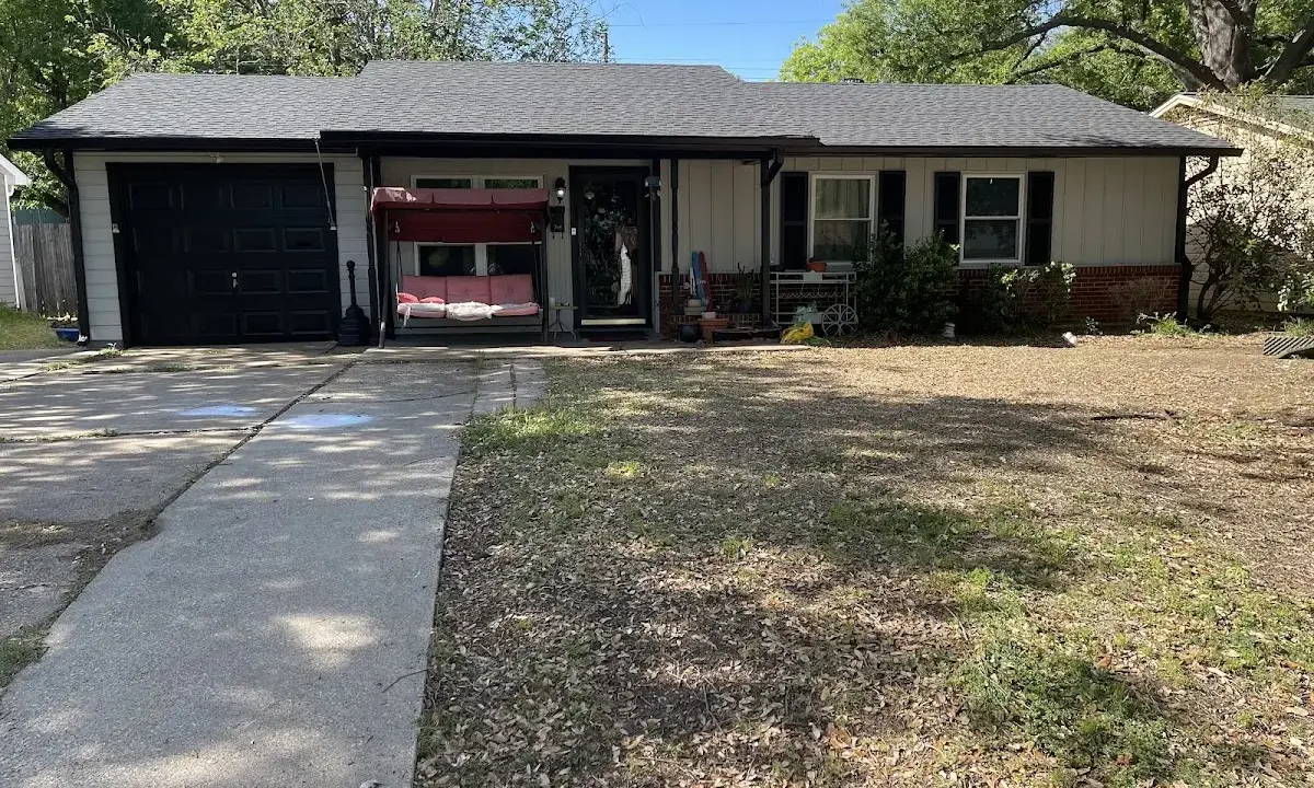 Asphalt Shingle Roof Repair crew at work on a residential roof in Cocoa